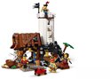 Fort LEGO pirate avec tour, coffre au trésor, canon et figurine squelette.