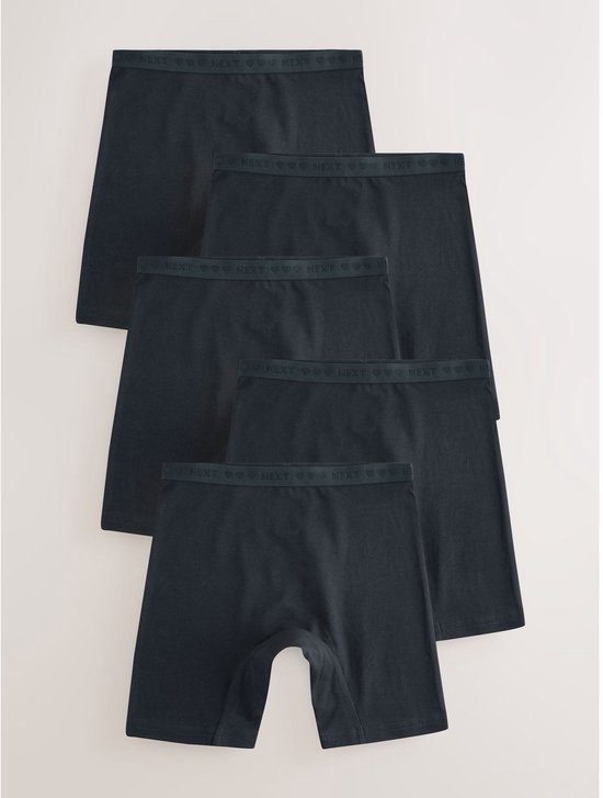 Vijf donkerblauwe boxershorts met een elastische band met 'NEXT' en hartjesprint.