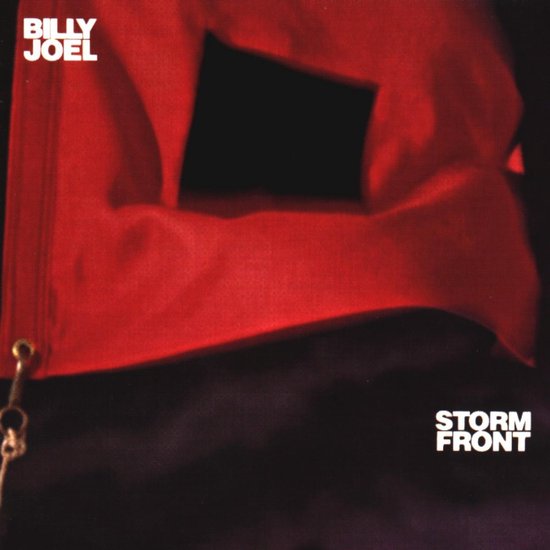 Albumhoes Storm Front van Billy Joel met een rode vlag en de tekst 'Billy Joel Storm Front'.