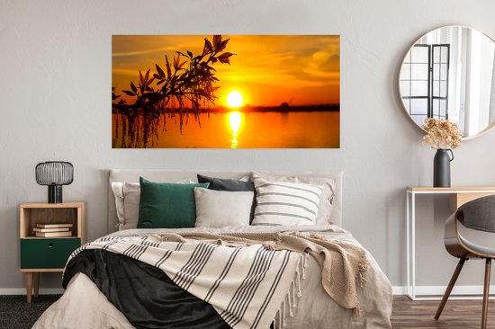 Poster Zonsondergang - Water - Planten - Oranje - 150x75 cm