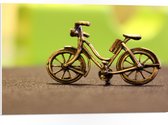WallClassics - PVC Schuimplaat - Miniatuurbeeld van Gouden Fiets - 75x50 cm Foto op PVC Schuimplaat (Met Ophangsysteem)