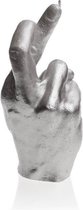 Zilver gelakte figuurkaars, design: Hand CRS Hoogte 19 cm (30 uur)