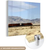 MuchoWow® Glasschilderij 20x20 cm - Schilderij acrylglas - Een rode trein in de woestijn - Foto op glas - Schilderijen