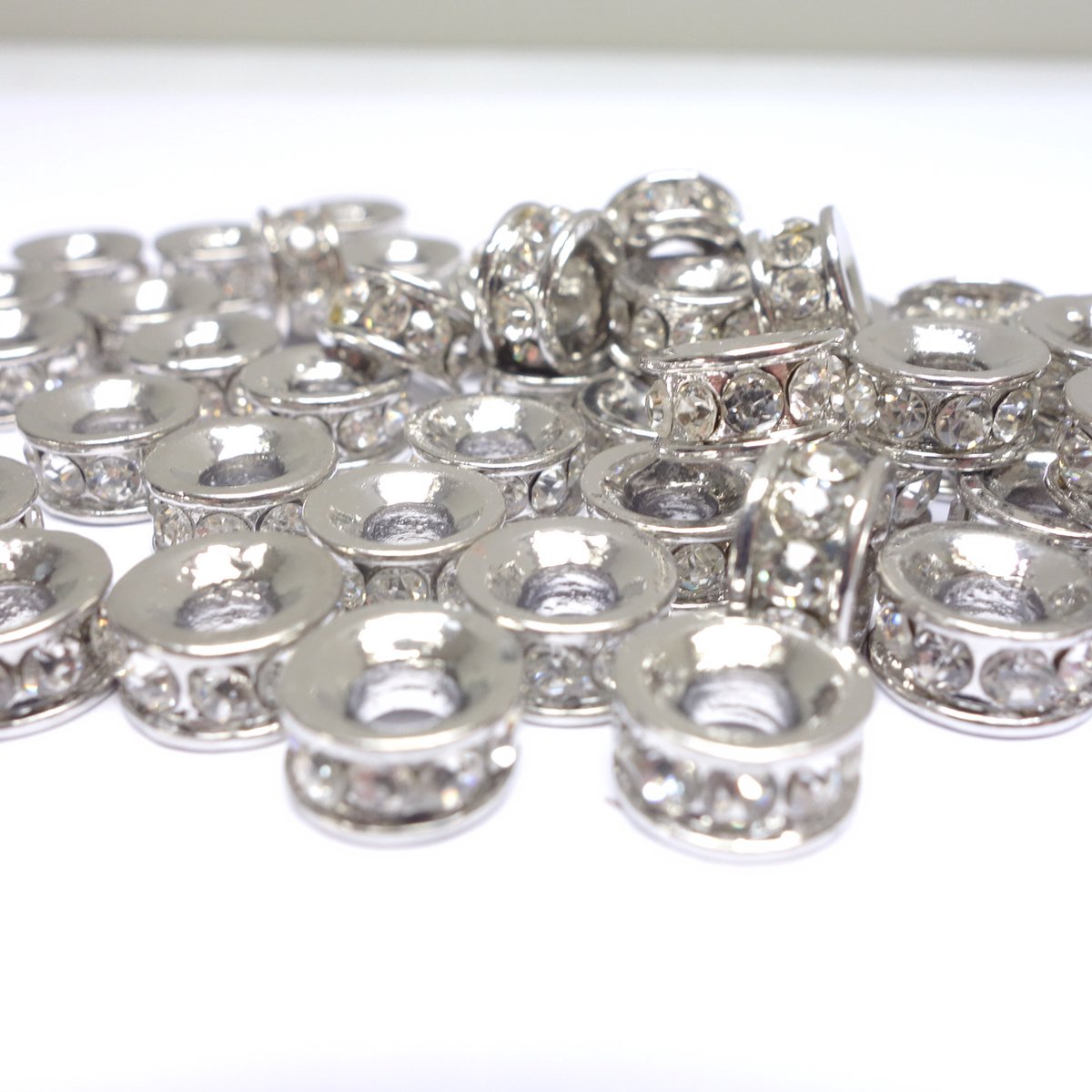 50 Strass Rondellen – 10 mm – Bergkristal – Platinum Plated – Anti-allergisch