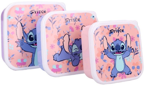 Trois boîtes à lunch violettes alignées avec Stitch joyeusement debout, couché et dans une autre pose.