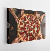 Canvas schilderij - High angle shot of a group of unrecognizable people's hands each grabbing a slice of pizza -     1120192331 - 80*60 Horizontal