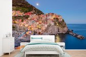 Behang - Fotobehang Het kleurrijke dorp van Manarola in Cinque Terre - Breedte 390 cm x hoogte 260 cm