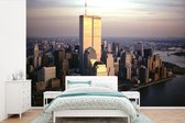 Behang - Fotobehang Luchtfoto van Manhattan's World Trade Center boven de Hudson rivier in New York - Breedte 330 cm x hoogte 220 cm