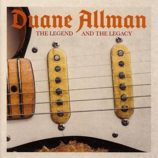 Close-up van een elektrische gitaar met de tekst "Duane Allman THE LEGEND AND THE LEGACY".
