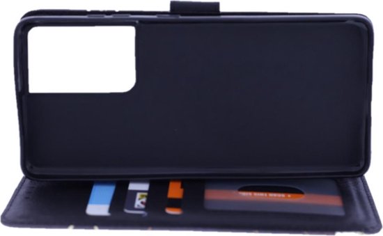 Intérieur d'un étui de téléphone avec porte-cartes et découpe pour appareil photo.