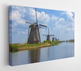 Canvas schilderij - Old windmill. Kinderdijk windmill park. Netherlands  -     690145777 - 80*60 Horizontal