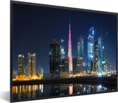Fotolijst incl. Poster - Kleurrijke gebouwen in Dubai en een paarse Burj Khalifa - 40x30 cm - Posterlijst