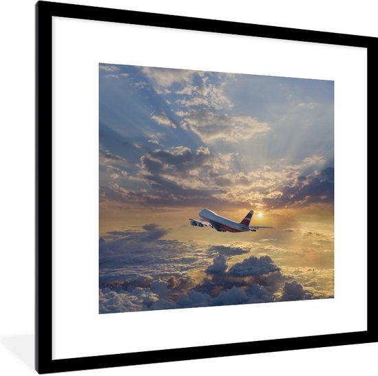 Affiche avec cadre Un avion volant dans le ciel avec des rayons de soleil - 40x40 cm