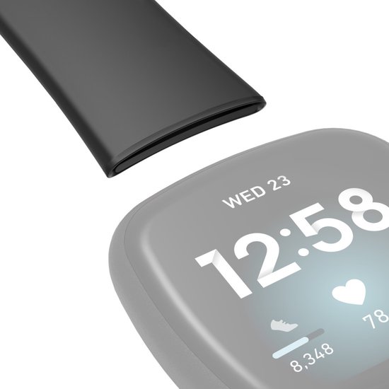 Détail du côté d'un bracelet de montre Fitbit noir et du bord de l'écran.