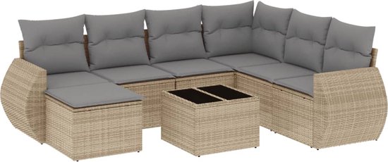 Ensemble de salon en poly rotin beige avec coussins gris, composé de modules et d'une table basse.