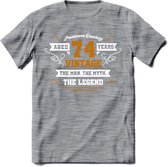 74 Jaar Legend T-Shirt | Goud - Wit | Grappig Verjaardag en Feest Cadeau Shirt | Dames - Heren - Unisex | Tshirt Kleding Kado | - Donker Grijs - Gemaleerd - M
