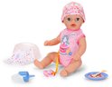 Zittende BABY born pop in roze romper, met speen, flesje, bordje met eten en luier.