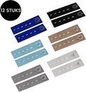 Twaalf broekverkleiners in het zwart, blauw, grijs, bruin en cyaan, gerangschikt per paar.