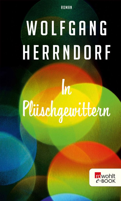 Boek "In Plüschgewittern" van Wolfgang Herrndorf met bokeh-effect in groen, geel en oranje.