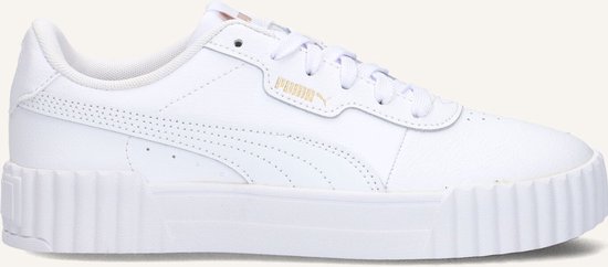 Détail du côté d'une basket Puma blanche avec logo doré.