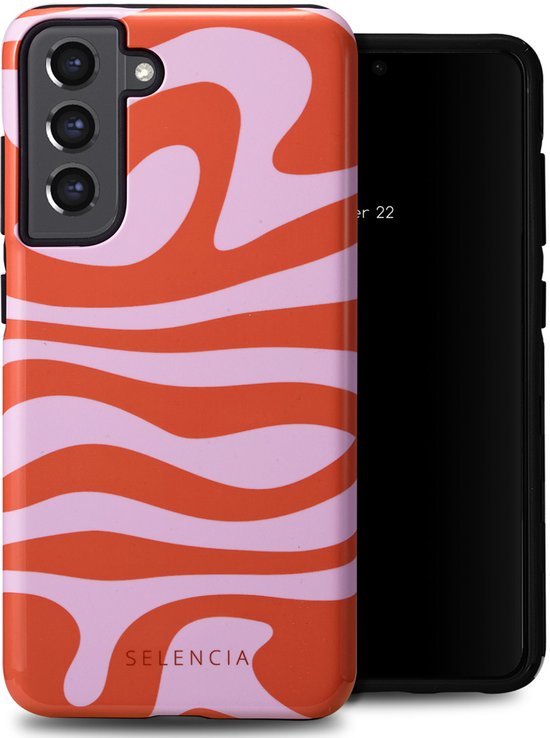 Coque de téléphone avec motif ondulé orange et rose à côté d'un téléphone.