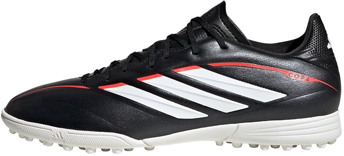 Zwarte adidas COPA PURE IV LEAGUE turf voetbalschoenen voor kinderen met witte en rode details, ontworpen voor comfort en ...