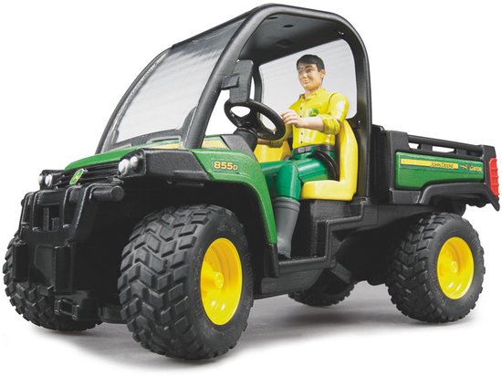 Groene John Deere Gator 855D met bestuurder in geel shirt, gele stoelen en zwarte rolbeugel.