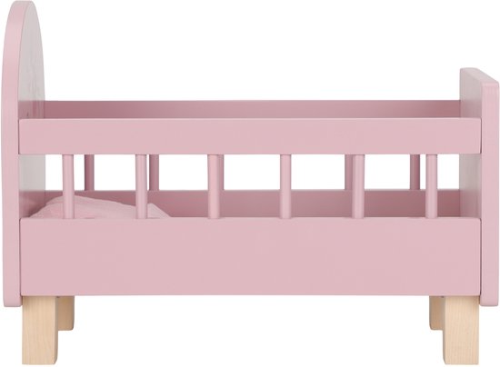 Roze poppenbed met spijlen en houten pootjes, aan de zijkant gezien.