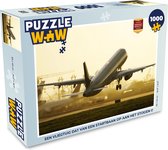 Puzzel Een vliegtuig dat van een startbaan op aan het stijgen is - Legpuzzel - Puzzel 1000 stukjes volwassenen