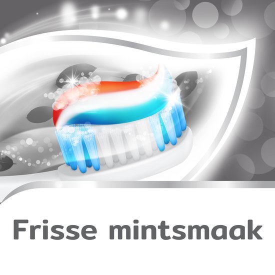 Tandenborstel met rode, witte en blauwe tandpasta, met muntblaadjes en bubbels.
