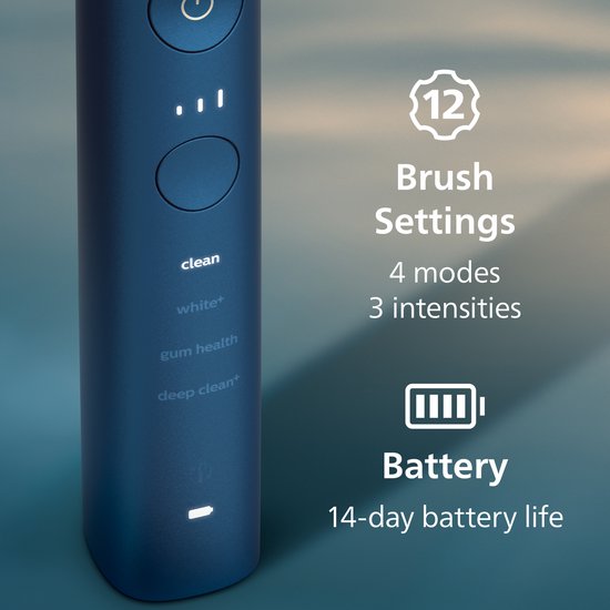 Detail van de donkerblauwe Philips Sonicare elektrische tandenborstel met poetsstanden en batterij-indicator.