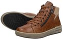 Cognackleurige leren dames sneaker met rits en corduroy boord, met zool zichtbaar.