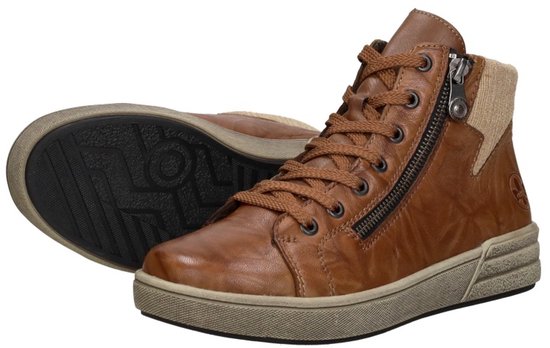 Cognackleurige leren dames sneaker met rits en corduroy boord, met zool zichtbaar.