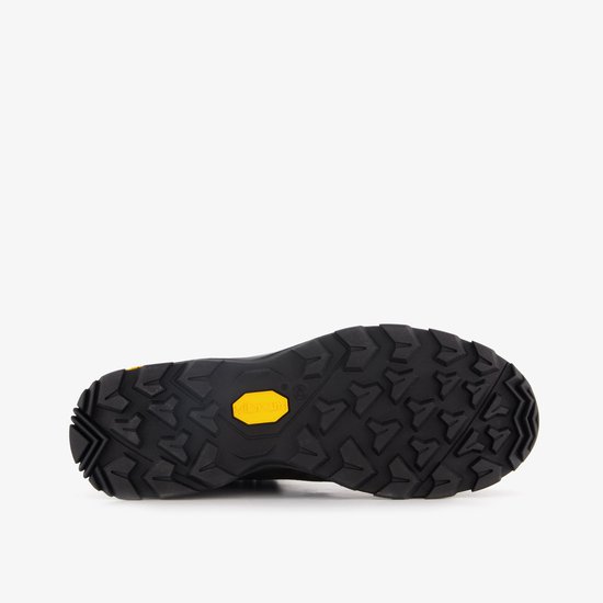 Zool van donkergrijze wandelschoen met Vibram profiel in geel.