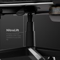 Gasveer ('NitroLift') van een grijze gamestoel, geschikt voor een belasting tot 250 kg.