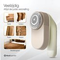 Beige pluizenverwijderaar, veelzijdig voor bank, sokken, trui, jas en beddengoed.