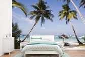Behang - Fotobehang Palmbomen en ligstoelen op het strand van Boracay - Breedte 525 cm x hoogte 350 cm