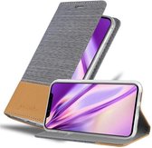 Cadorabo Hoesje geschikt voor Apple iPhone X / XS in LICHTGRIJS BRUIN - Beschermhoes met magnetische sluiting, standfunctie en kaartvakje Book Case Cover Etui