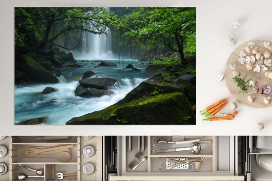 KitchenYeah® Inductie beschermer 81.6x52.7 cm - Helderblauwe wilde rivier en watervallen in het regenwoud van Costa Rica - Kookplaataccessoires - Afdekplaat voor kookplaat - Inductiebeschermer - Inductiemat - Inductieplaat mat