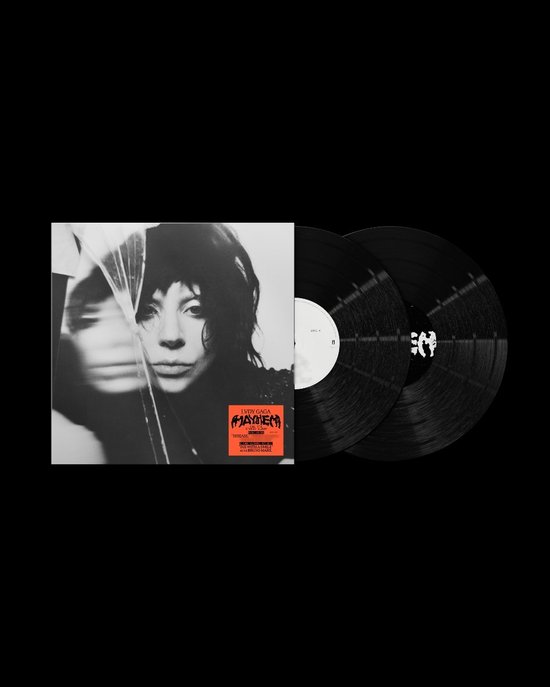Dubbel LP albumhoes met een zwart-wit portret van Lady Gaga door gebroken glas. Twee zwarte platen.