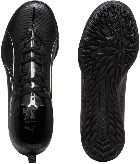 Chaussures de football noires Puma, dessus lacé et semelle