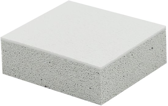 Wit reinigingsblok met grijze spikkels en een gladde witte toplaag.