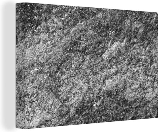 Canvas Schilderij Close-up van een rotsen structuur in het zwart-wit - 150x100 cm - Wanddecoratie