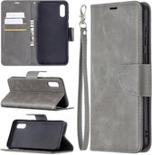 Voor Samsung Galaxy A02 Retro Lamsvacht Textuur Pure Kleur Horizontale Flip PU Lederen Case met Houder & Kaartsleuven & Portemonnee & Lanyard (Grijs)