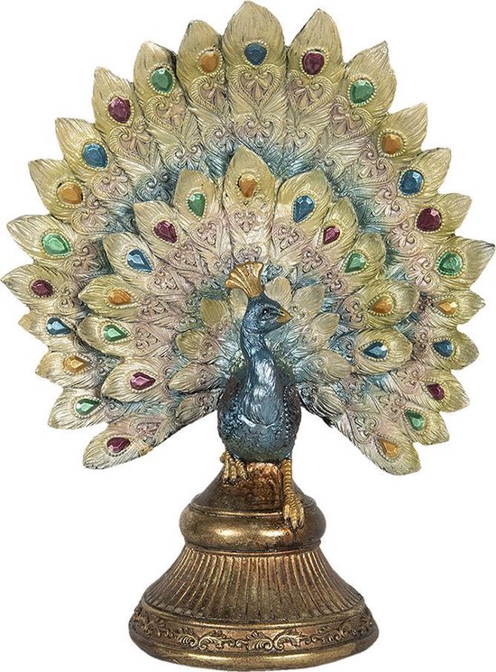 Paon doré orné de pierres colorées scintillantes dans ses plumes de queue, sur un socle doré.