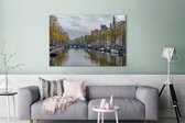 Canvas Schilderij Alledaagse foto van de Prinsengracht van Amsterdam - 120x80 cm - Wanddecoratie
