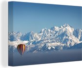 Canvas Schilderij Stijgende luchtballon bij de Mont Blanc - 60x40 cm - Wanddecoratie