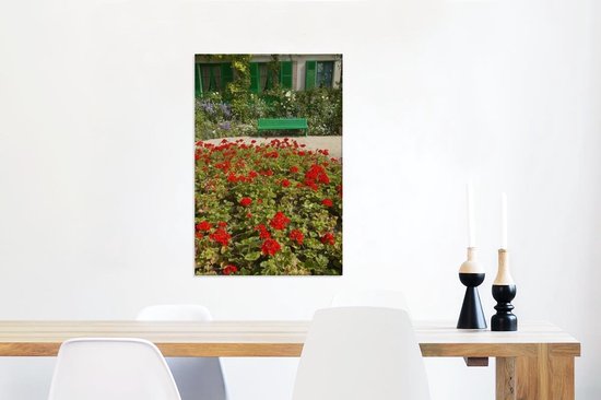 Canvas Schilderij Bankje met bloemen in de Franse tuin van Monet in Europa - Wanddecoratie