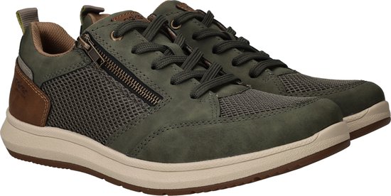 Paar groene sneakers met rits en bruine accenten, vanuit een hoek.