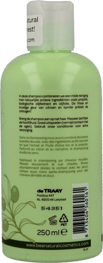 Achterkant van een groene fles shampoo van Bee Honest, met productinformatie en een afbeelding van olijftakken.